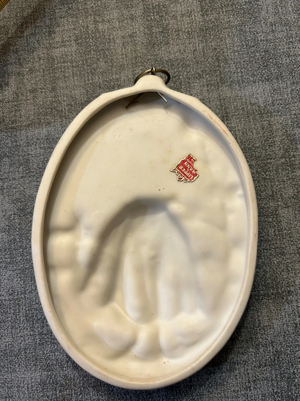 vintage 3D ceramic wall plaques, likely made by Lipper & Mann